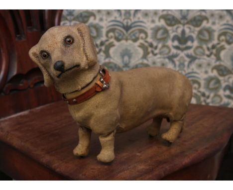 A late 19th century/early 20th century novelty clockwork automaton toy, in the form of a Dachshund, by Roullet &amp; Decamps 