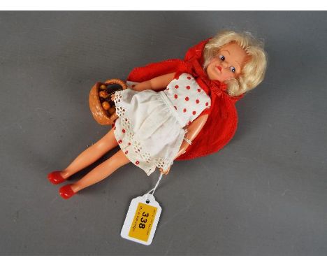 Pedigree Sindy - A Pedigree Sindy blonde 'Patch' doll with painted eyebrows, eyes and freckles, wearing a 'Little Red Riding 