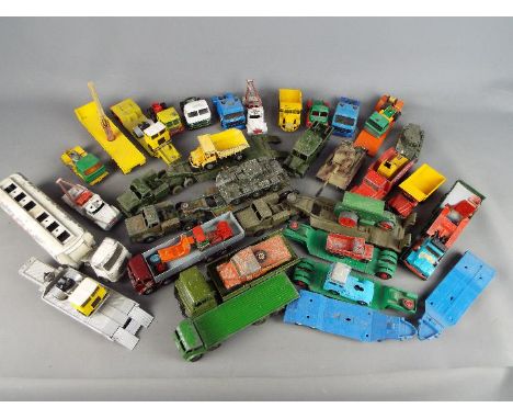 Corgi, Dinky, Matchbox - A collection of approximately 30 diecast vehicles in various scales some incomplet. Lot includes Din