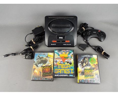 Sega - An unboxed Sega Mega Drive II games console, controller, power supply plus 3 boxed Sega games including Jungle Strike;
