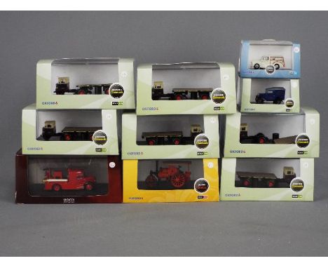 Oxford Diecast, Atlas Editions - 10 boxed 1:76 scale model vehicles by Oxford Diecast. Lot includes MH003 GWR Flatbed Trailer