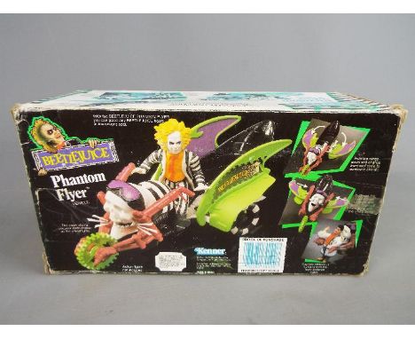 Kenner - A boxed Kenner 'Beetlejuice' Phantom Flyer vehicle. Model appears to be in Mint condition, with a Kenner brochure an