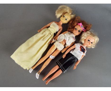 Pedigree Sindy - A collection of three Pedigree Sindys comprising a short, blonde haired Sindy with painted eyebrows and lash