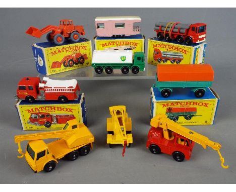 Matchbox by Lesney - A collection of nine diecast Matchbox vehicles, 5 of which are boxed. Boxed items include #69 Hatra Trac