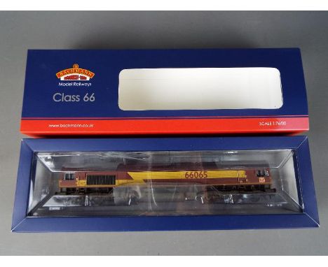 Bachmann - A boxed Bachmann #32-737 OO gauge 21 DCC 'Weathered' Class 66 Diesel Locomotive Op.No.66065 in DB Schenker (Ex EWS