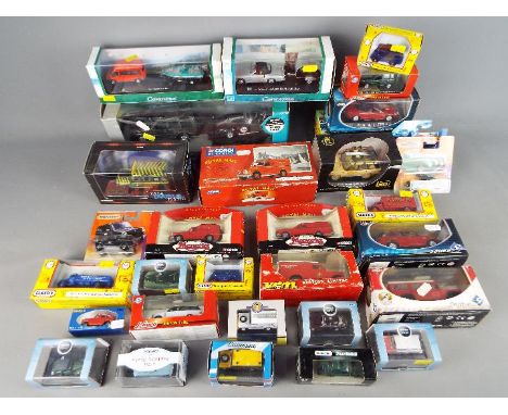 Corgi, Cararama, Oxford Diecast, Schuco and others - A group of over 20 boxed diecast model vehicles in various scales. Lot i