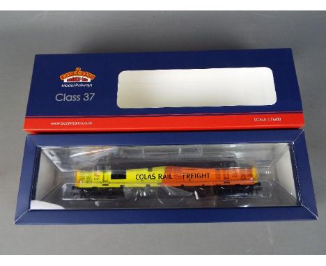 Bachmann - A boxed Bachmann #32-389 OO gauge 21 DCC 37/4 Diesel Locomotive Op.No.37421 in Colas Rail Freight livery. The mode