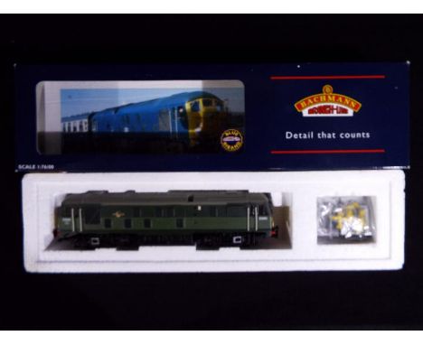 Bachmann - A boxed Bachmann OO gauge #32-427 Class 24 Diesel Locomotive Op.No.D5085 in Two Tone Green BR livery. Model appear