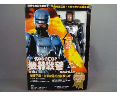 Toy Island, Orion Toys, Skyvision - A boxed 1995 Japanese Imported 15" Toy Island Robocop Action Figure . The figure appears 