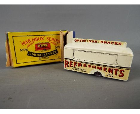 Matchbox - A boxed Matchbox #74 Mobile Canteen. The model with cream body, grey plastic wheels, and light blue base appears t