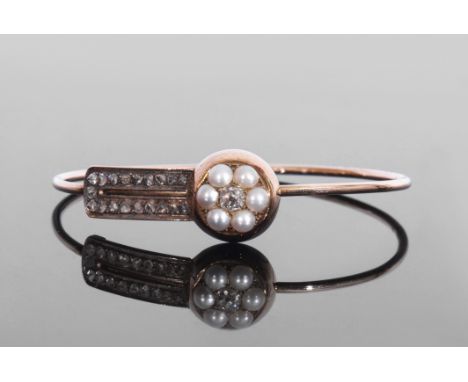 Antique pearl and diamond bangle, applied to the front with an old cut diamond and a pearl cluster, the shoulder set with ros