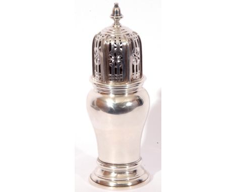 Art Deco silver sugar caster, the plain baluster body with pull off pierced lid and urn finial, on a stepped spreading foot, 