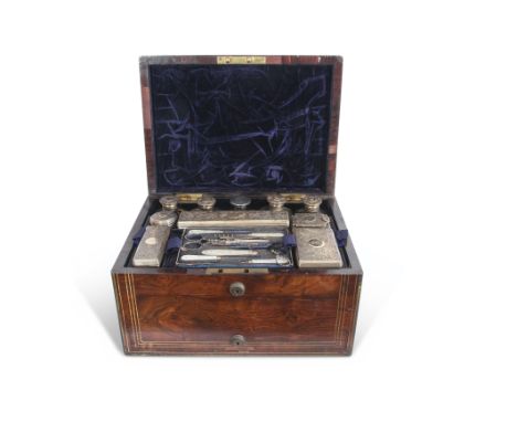 William IV rosewood ladies dressing case or vanity box, the fitted box lined with plush purple velvet and contains compartmen