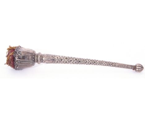 Late 19th century Continental white metal model of a torch, with fish scale tapering cylindrical handle and onion shaped fini