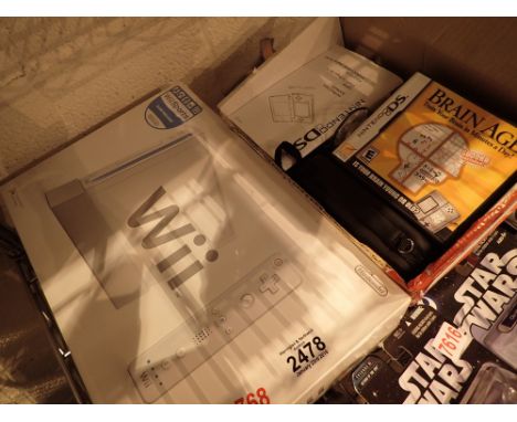 DS games console with five games and a Wii games console CONDITION REPORT: Appear to be in good condition. We do not test the