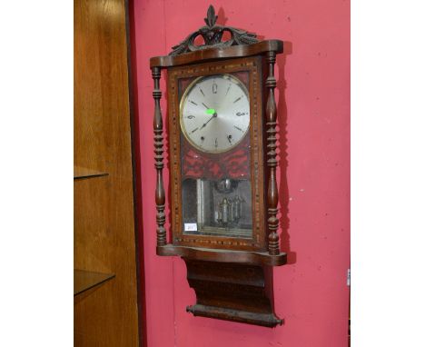 A 19th century cross banded mahogany Vienna wall clock with turned uprights and further tunbridge ware inlay