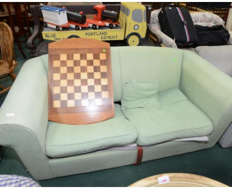 A sofa bed; tog. with a chess board