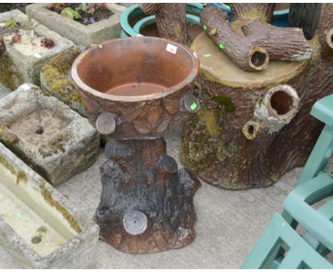 A strawberry planter on stand
