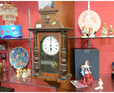 A mahogany cased wall clock