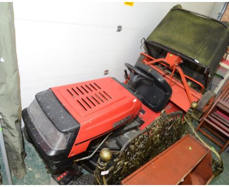 A large ride on lawn mower with a Briggs and Stratton engine