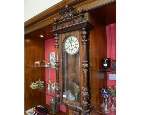 A mahogany cased Vienna wall clock