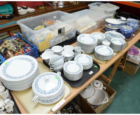 Three trays containing an extensive Noritake dinner service