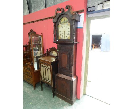 An 18th century oak longcase clock, the 12in dial with roman numerals and painted floral spandrels, painted in the arch with 