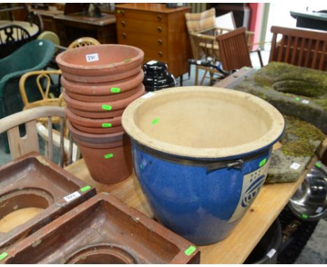 A group of terracotta plant pots and a glazed earthenware planter (6)