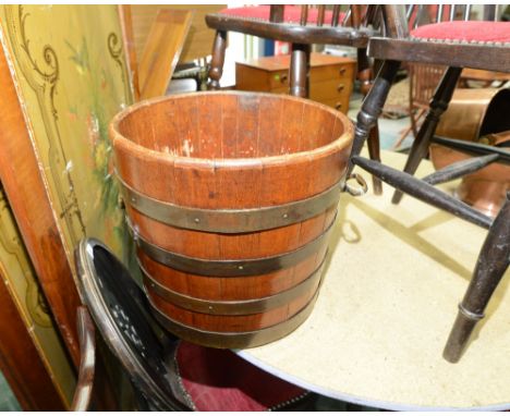 A coopered wooden planter 