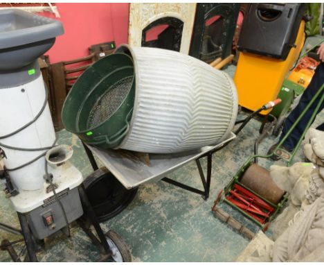 A wheelbarrow; a galvanised grain bin; a sifter and garden tools