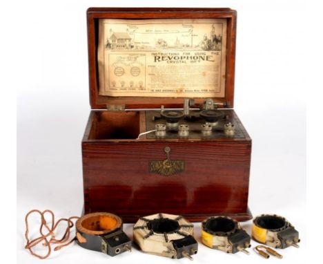A CABLE ACCESSORIES CO LIMITED REVOPHONE CRYSTAL SET, WITH EBONITE CONTROL PANEL AND THREE TUNEWELL COILS AND ONE OTHER, IN M