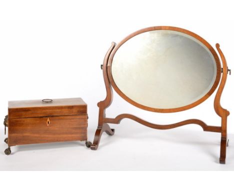 A VICTORIAN BRASS MOUNTED MAHOGANY TEA CADDY ON CLAW AND BALL FEET AND AN INLAID MAHOGANY DRESSING MIRROR