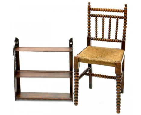 A VICTORIAN BOBBIN TURNED OAK CHAIR WITH RUSH SEAT AND A SET OF VICTORIAN MAHOGANY HANGING SHELVES 