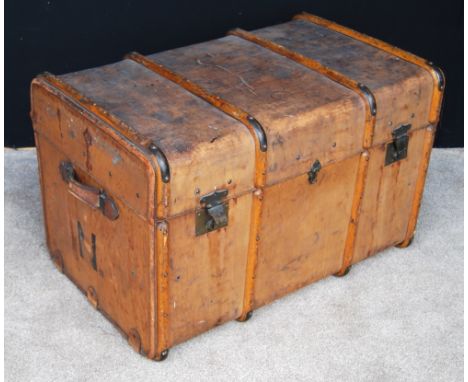 Large leather travel trunk bound with runners, 97cm wide, 60cm high and 60cm deep.