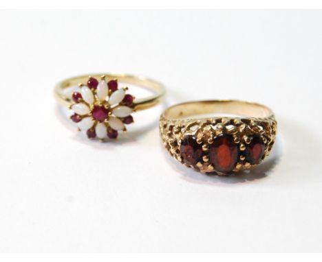 Garnet ring and another, with opals, in 9ct gold, both size R.