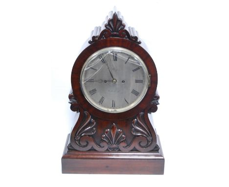 19th century mahogany bracket clock by Bryson of Edinburgh, the drum head mounted by scrolling finial, brass face and foliate