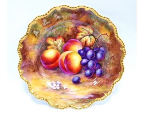 Royal Worcester bone china lobed plate with hand painted decoration of plums and grapes, by Horace H. Price, signed, puce mar