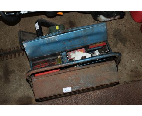 A cantilever tool box and contents of various hand tools