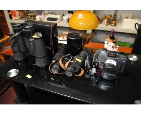 A pair of 10 x 50 binoculars; Olympus camera etc. 
