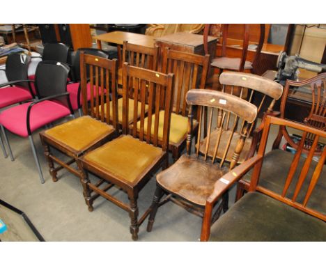 Two elm seated stick back chairs and four oak dining chairs