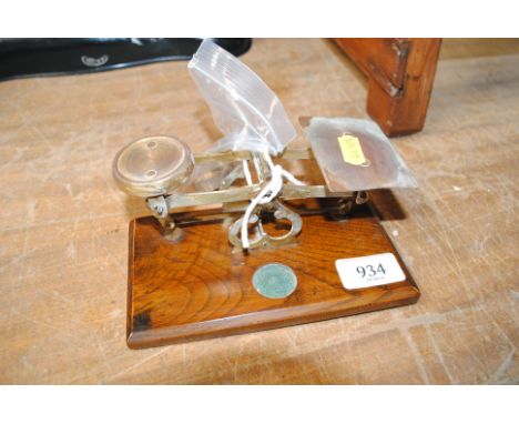 A set postage scales and weights 