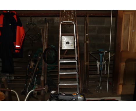 A wooden step ladder and a aluminium step ladder