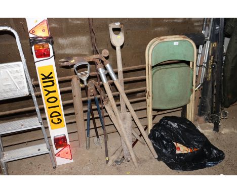 A quantity of long handled gardening tools