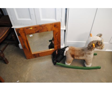 A wooden framed wall mirror; rocking horse and a bag of Vax vacuum cleaner attachments