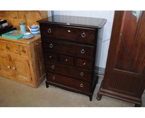 A Stagg chest fitted with an arrangement of seven drawers 