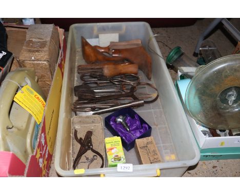 A box containing shoe makers tools etc 