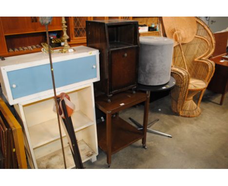A white painted shelf; wall cupboard; two tiered trolley; bedside cupboard