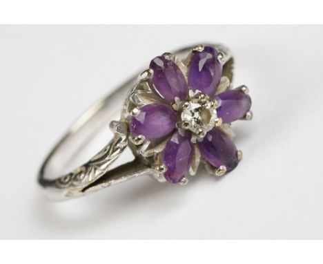A ladies fully hallmarked 9ct white gold and amethyst dress ring. approx 5g in weight. 
