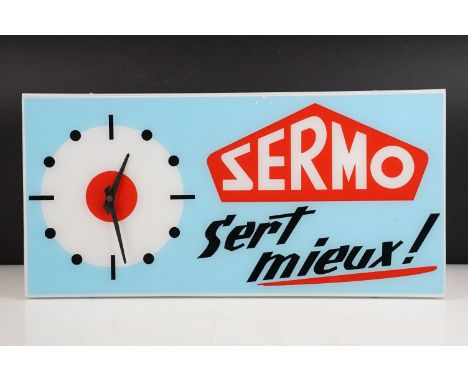 Advertising - ' Sermo - Sert Mieux! ' French advertising clock on a pale blue ground, approx 49cm wide 