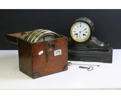 Victorian slate mantle clock of barrel &amp; scroll form, the white enamel dial with Roman numerals, the movement stamped 'A&